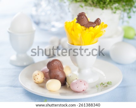 Easter decoration with chocolate rabbit and chicken, selective focus
