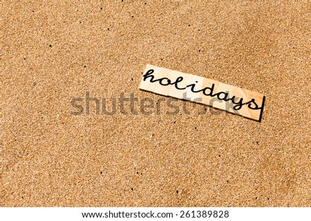 Words on sand. Words formed from small pieces of wood containing different letters with children Stroke.