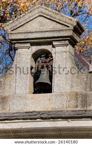 Church bell tower in a mediterranean forest