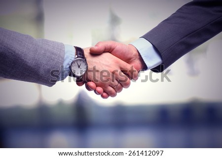 Closeup of a business handshake, on white background