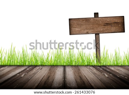 Wood plank on natural green grass field and sign wood old