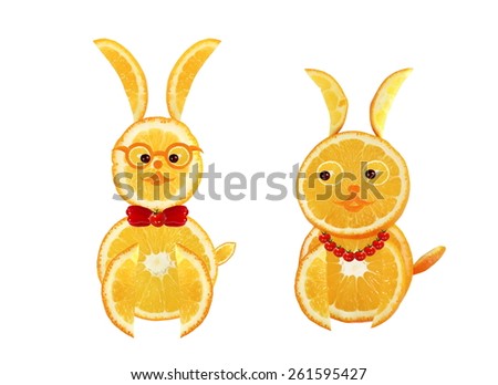 Creative food concept. Two funny easter yellow rabbits