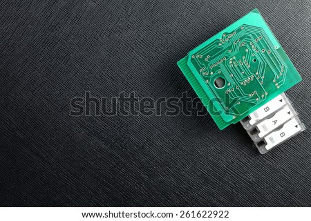 Old classic and vintage style of mini cassette and circuit board represent the sound recording technology. 