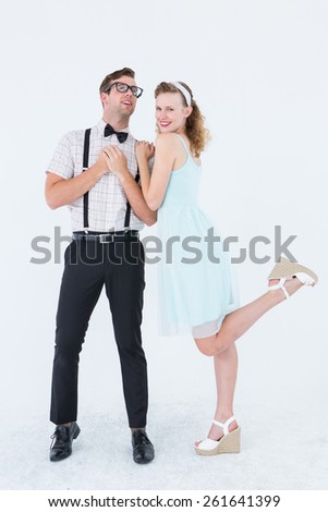 Hipster couple having fun together on white background