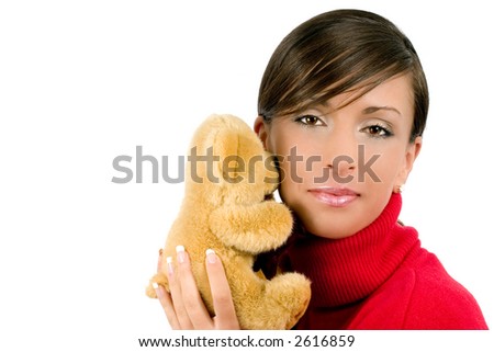 Lovely and beautiful young girl with sweet teddy bear.