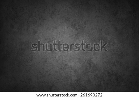 Grey textured wall, dark edges Royalty-Free Stock Photo #261690272