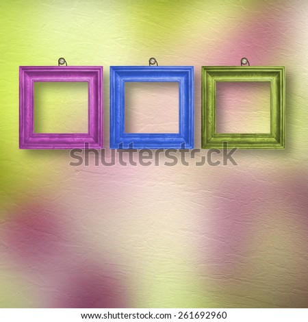 Multicolored bright frames hanging on the abstract pastel background