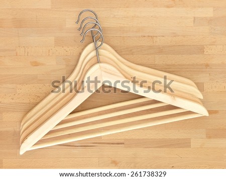 A close up shot of wooden clothes hangers