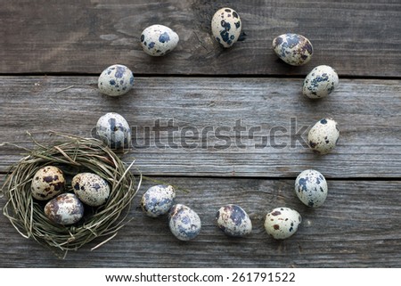 Quail eggs on a rustic wooden table