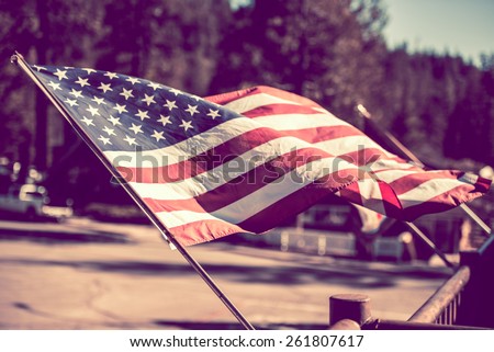 American Flag. 4th of July City Decoration. Vintage Grading. Royalty-Free Stock Photo #261807617