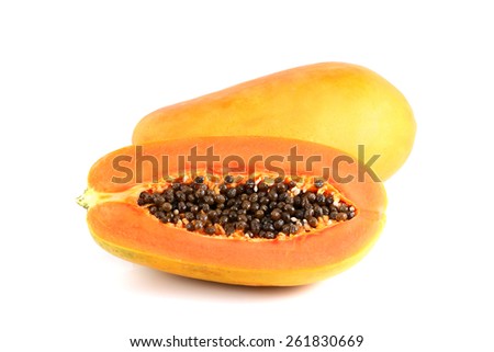 sweet papaya on the dish with green papaya leaf