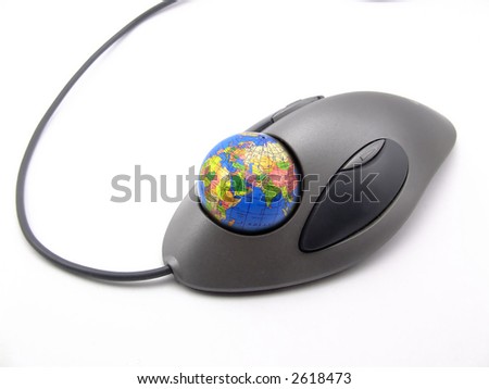 A funny picture of a trackball containing a globe as ball. Representing the control over the word wide web with the "mouse". Can also represent the online buying of trips around the world.