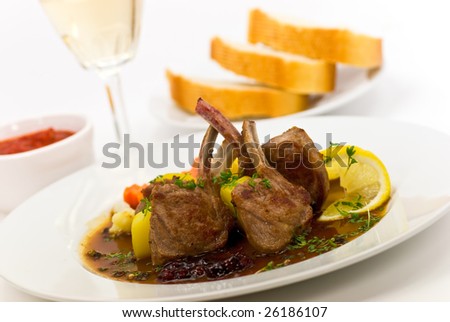 Close up picture of a roasted lamb chop-fillet- and vegetables