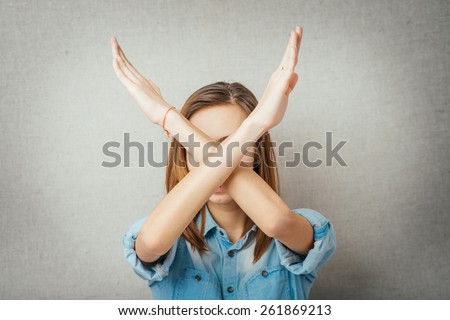 girl shows no hands Royalty-Free Stock Photo #261869213