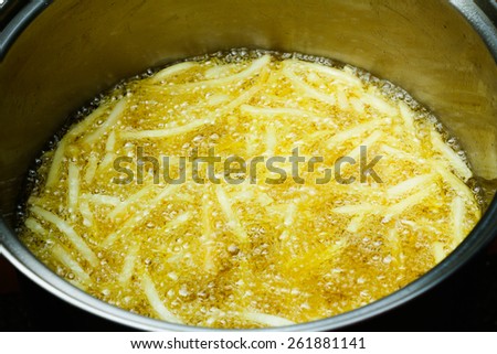 French fries in deep fryer