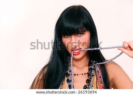Woman biting lips and teeth in collar