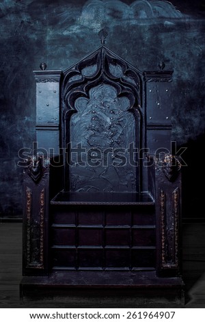 Royal throne. dark Gothic throne, front view Royalty-Free Stock Photo #261964907