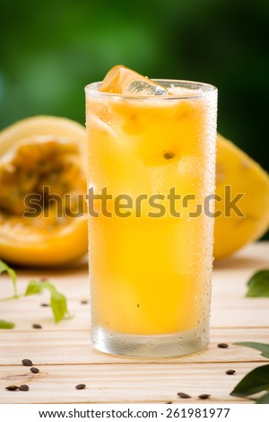 Passion fruit juice Royalty-Free Stock Photo #261981977