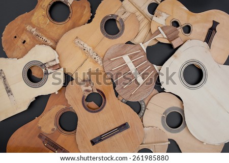 Old parts of broken guitars