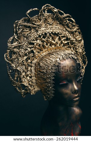  Mannequin in golden head wear
