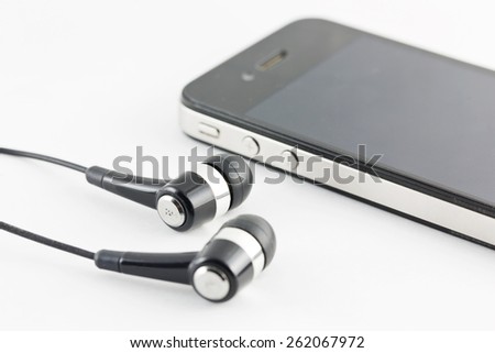 Black Earphone and Smartphone equipment set isolated on white background : iPhone