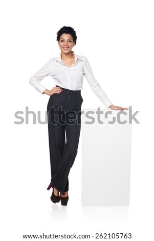 Full length smiling business woman portrait with blank white board, isolated on white background