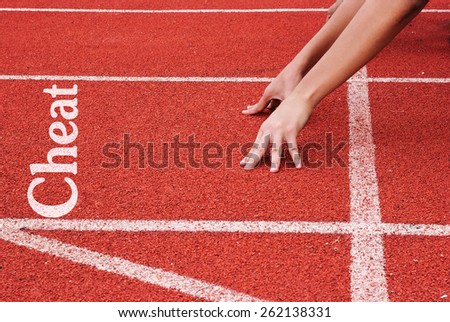 cheat - hands on starting line Royalty-Free Stock Photo #262138331
