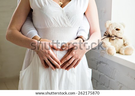 pregnancy and pregnant belly Royalty-Free Stock Photo #262175870