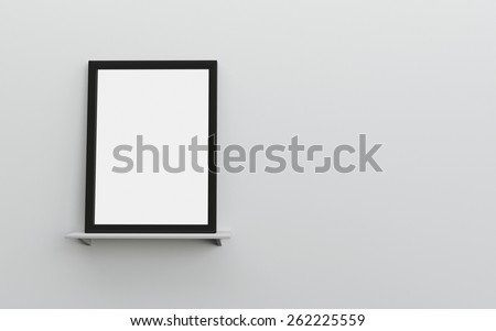 Black blank photo frame on a white shelf grey wall with space for text