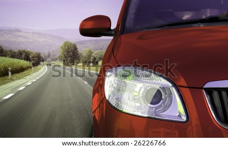 Fast car on the highway. Royalty-Free Stock Photo #26226766