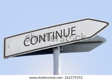CONTINUE word on road sign