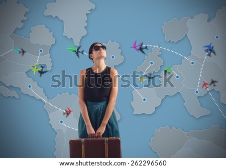 Globetrotting woman looking for a new destination Royalty-Free Stock Photo #262296560
