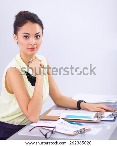 Modern young fashion designer working at studio.isolated
