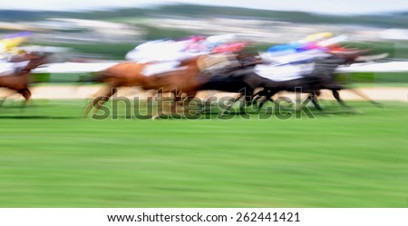 Motion blurred horse race background