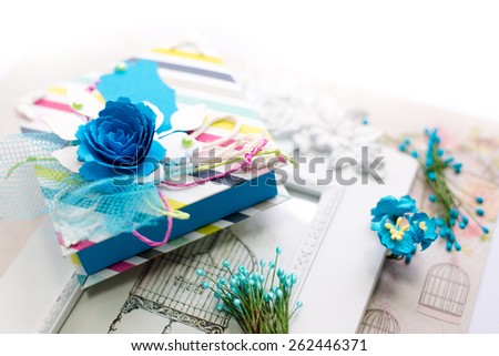 Close up picture of gift wrapped in craft paper on artistic copy space background