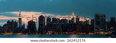 Midtown Manhattan skyline at dusk panorama over East River