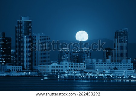 San Diego downtown skyline and full moon over water at night in BW