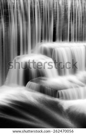Detail of the Seeley's Pond waterfall, in New Jersey. The very long exposure and the natural motion blur creates an artistic smooth and silky effect on the falling water.