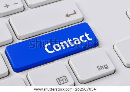 A keyboard with a blue button - Contact