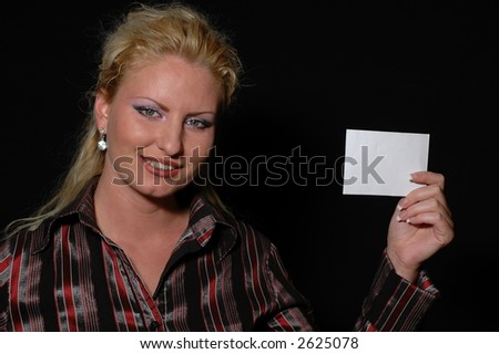 Woman holding a leaf of the white paper
