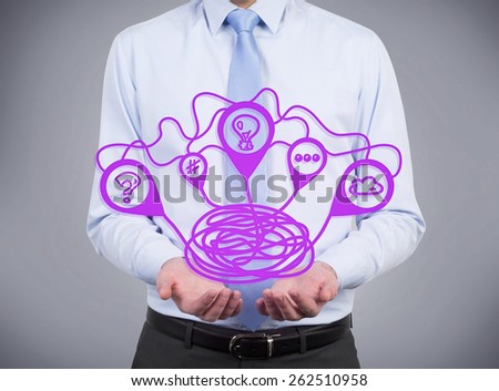 businessman holding brainstorming scheme in hand