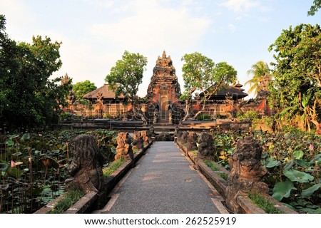 Lotus pond and Pura Saraswati temple in Ubud, Bali, Indonesia. Royalty-Free Stock Photo #262525919