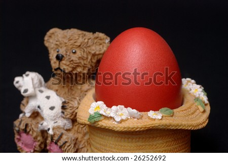 Red Easter egg in a egg stander