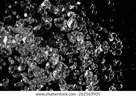 Water drops hover in the air freezed by shot