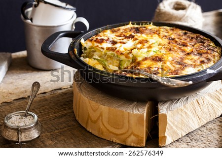 casserole of rice, vegetables, cheese and zucchini Royalty-Free Stock Photo #262576349