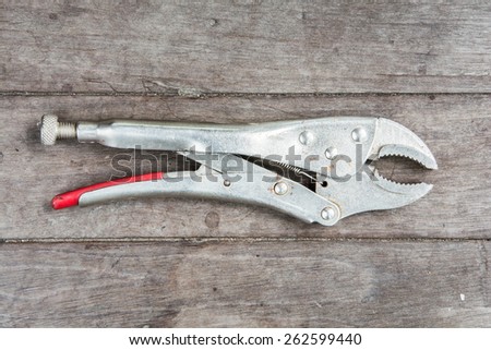 wrench on wooden background