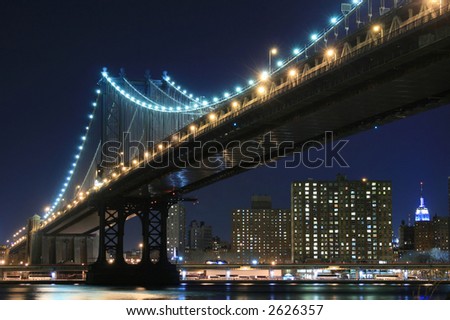 Manhattan Bridge and Manhattan skyline At Night