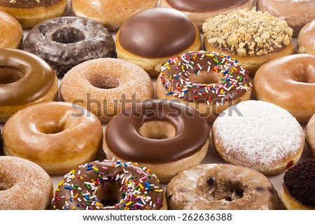 Horizontal Background of Donuts or Doughnuts Royalty-Free Stock Photo #262636388