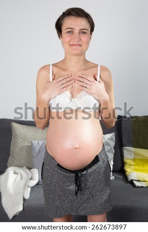a pregnant woman on a white background