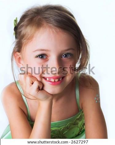 a little innocent girl in green dress
